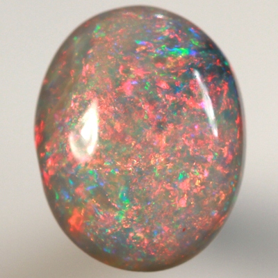 SOLID BLACK OPAL Top quality. Filled with bright red fire, high dome.  SEE VIDEO